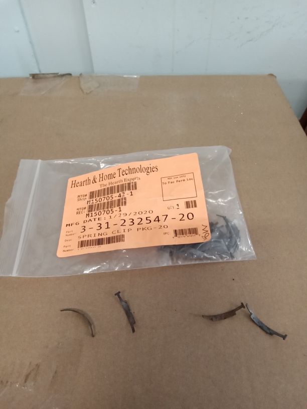 Spring clip for brass trim