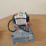 Vertical motor for feed disc