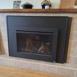 Travis Industries - Lopi Model 34 DVL GS2 Insert NG - with black glass fire back, classic logs, times square face, and 3 piece panels