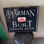 Harman back lit sign